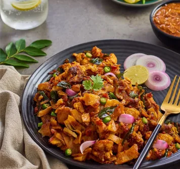 Chicken kothu parotta freshly made at Sixty5 Street Brampton